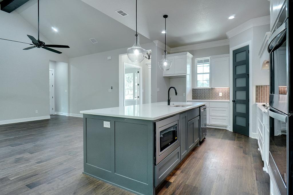 Kitchen area in custom home by Living Stone Construction